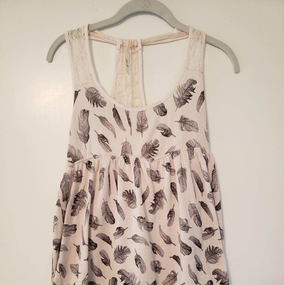 Super cute tank top with lace and feathers